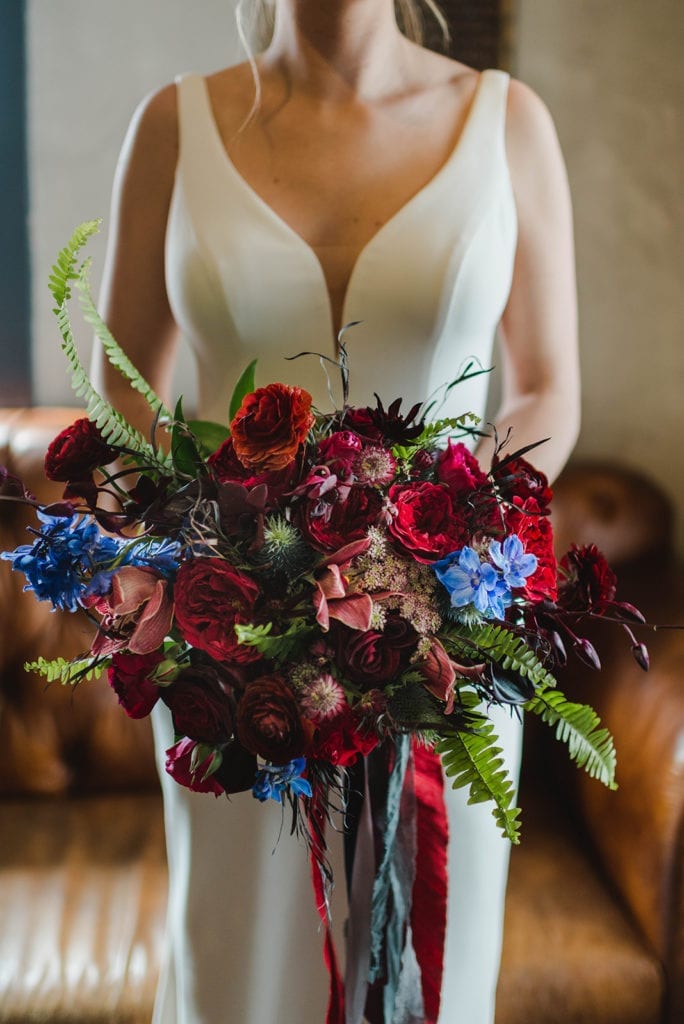 moody jewel-toned bouquet with ferns