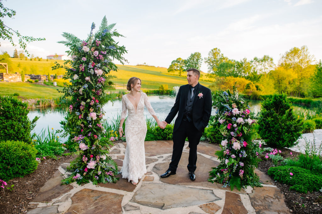 outdoor ceremony with pastel flowers