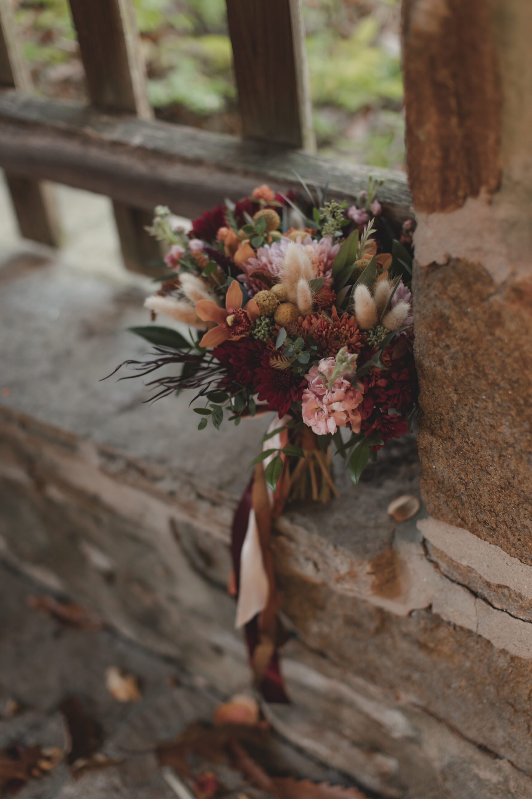 fall inspired bridal bouquet with copper and rust dahlias and mums